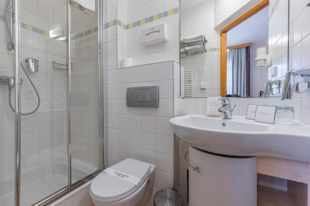 Kúpeľňa v ubytovaní Hotel Nosalowy Dwór
