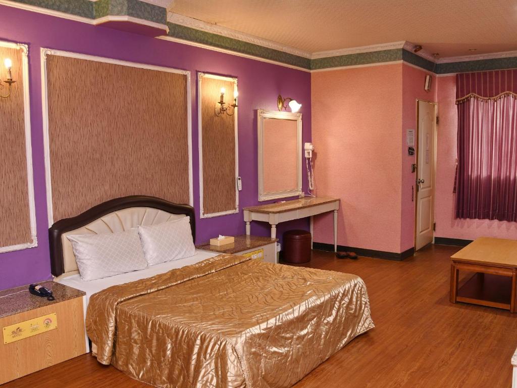 Postel nebo postele na pokoji v ubytování Love Boat Motel