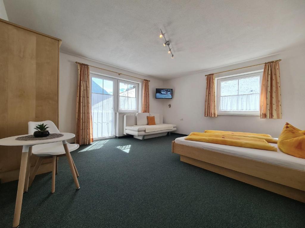 Postel nebo postele na pokoji v ubytování Appartement Skorpion