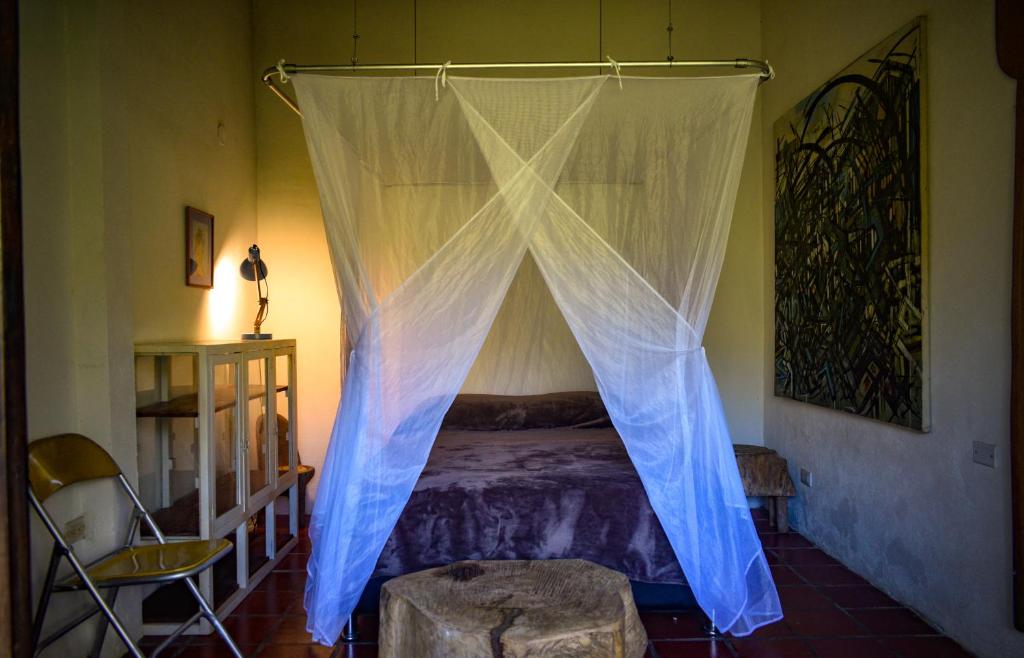 Postel nebo postele na pokoji v ubytování Casa El Cedro