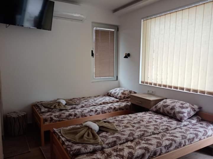 Voodi või voodid majutusasutuse Apartman Oreol toas