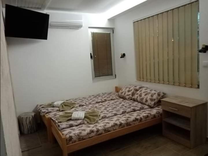 Voodi või voodid majutusasutuse Apartman Oreol toas