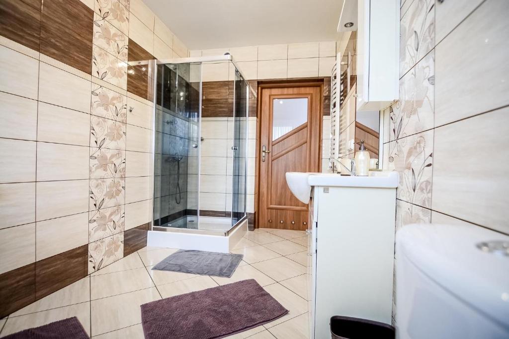 Kúpeľňa v ubytovaní Apartamenty Przystanek Bańska