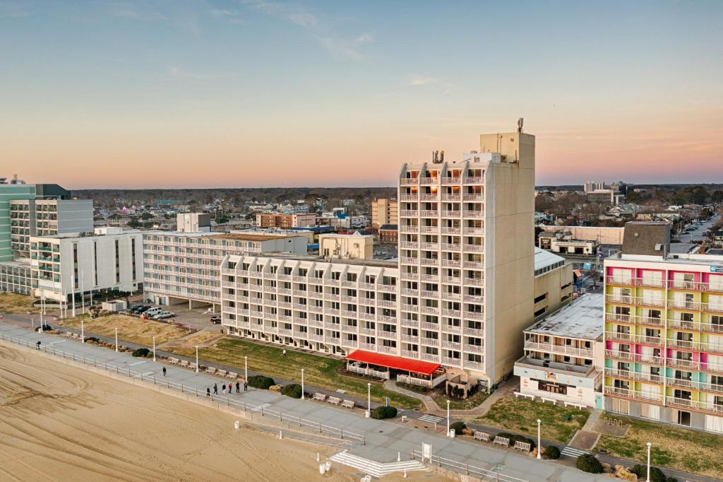 an aerial view of a city with a tall building at Ocean Sands Resort, Oceanfront, Virginia Beach by Vacatia in Virginia Beach