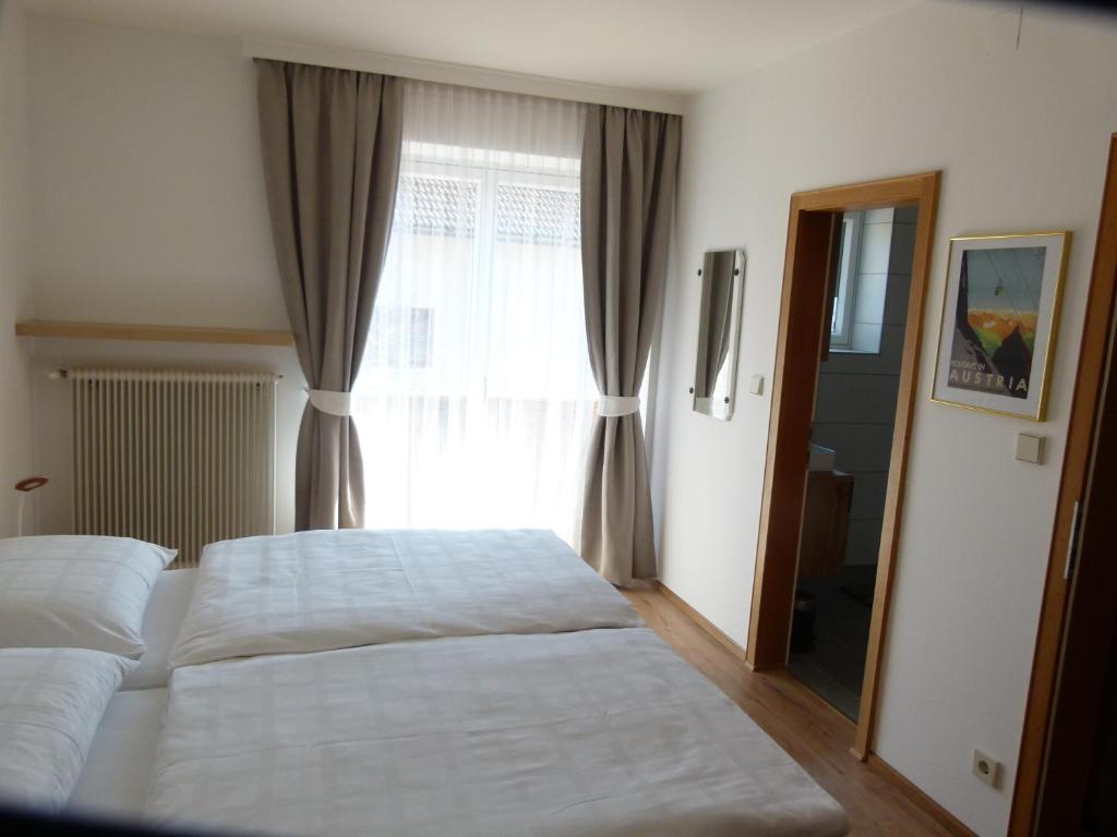 Postel nebo postele na pokoji v ubytování Appartment SONNENBLICK