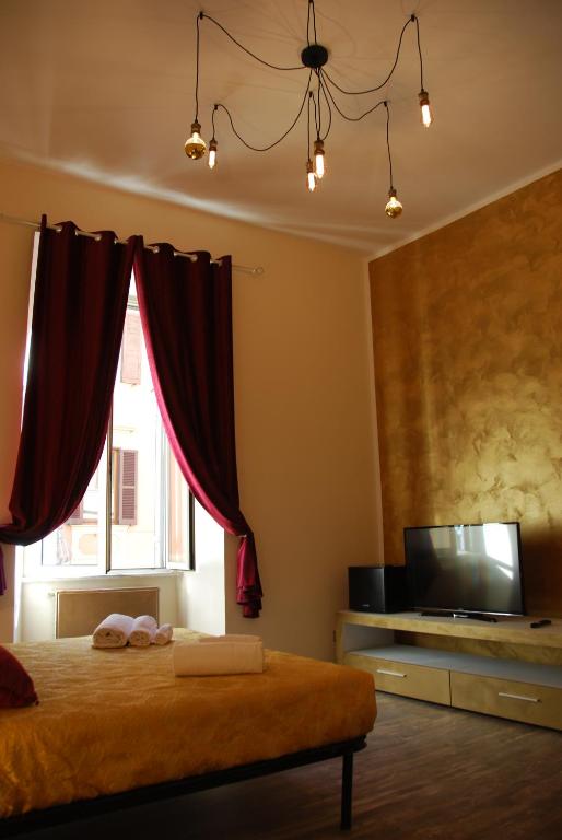 Posteľ alebo postele v izbe v ubytovaní Home Art Colosseo