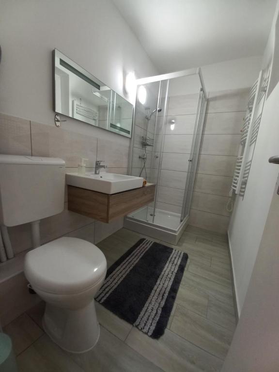 Kúpeľňa v ubytovaní Onix -Orfű Aqua Apartman