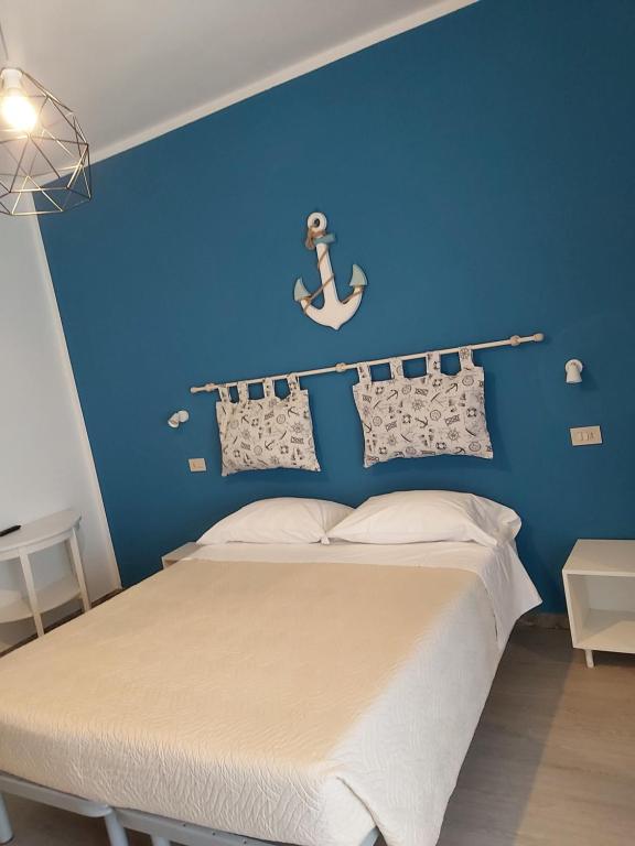 Postel nebo postele na pokoji v ubytování Hotel 21 Riccione
