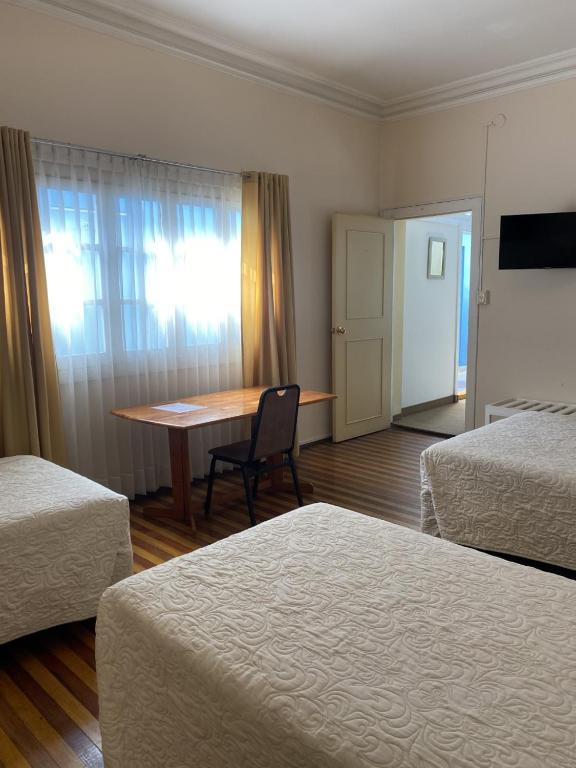 Postel nebo postele na pokoji v ubytování Los Andes Bed & Breakfast