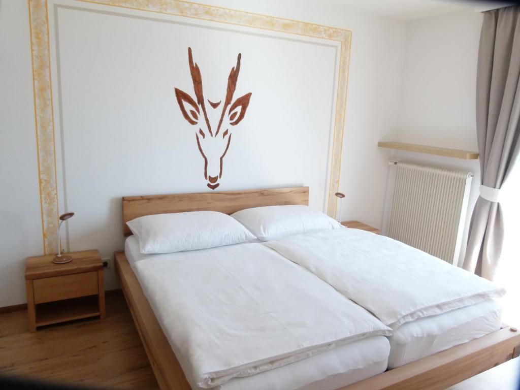 Postel nebo postele na pokoji v ubytování Appartment SONNENBLICK