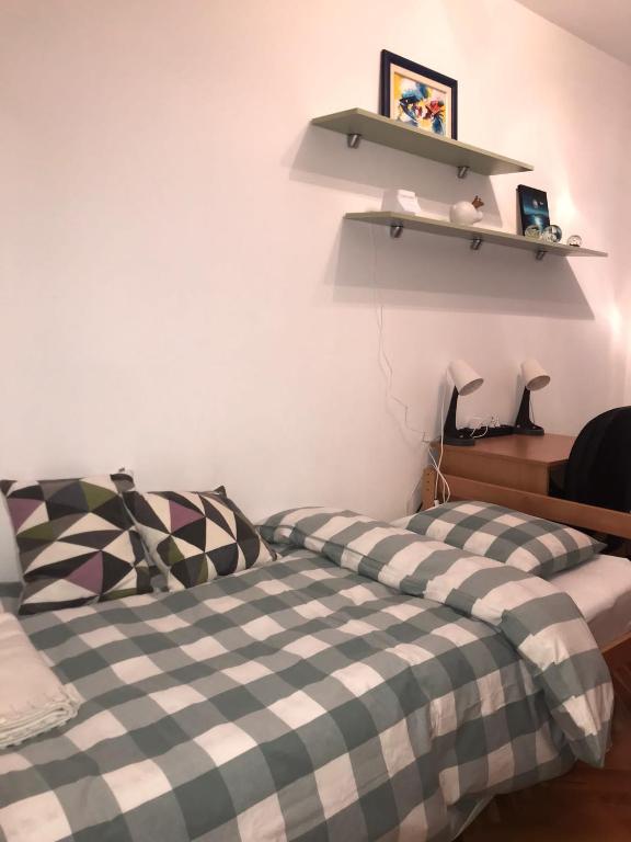 Postel nebo postele na pokoji v ubytování Apartment Bucka