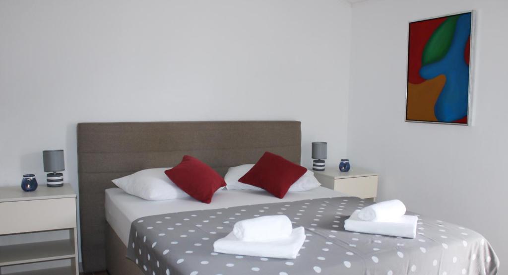 Postel nebo postele na pokoji v ubytování Penthouse Altus