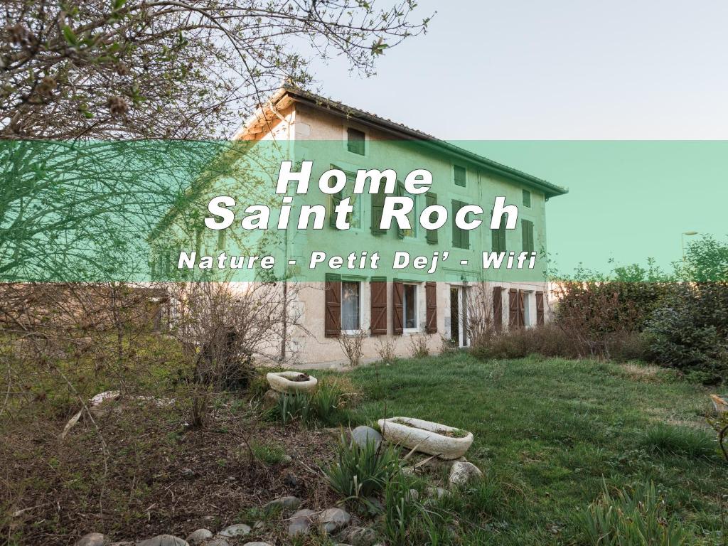 Una casa con un letrero que lee "Home Sait Rock" en Home saint roch, en Martres-Tolosane