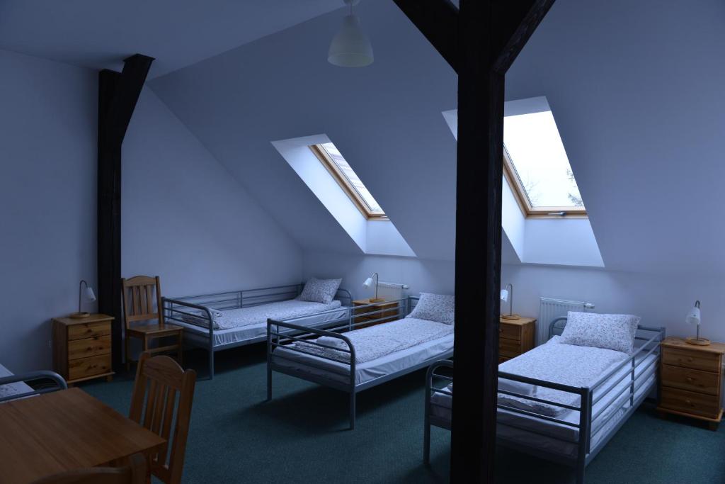 Pokoje Gościnne Domu Pielgrzyma w Supraślu - Habitación Cuádruple Clásica