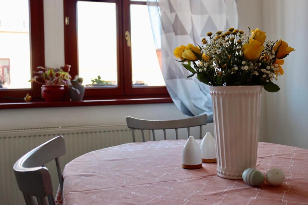 Postel nebo postele na pokoji v ubytování Penzion U Kapra
