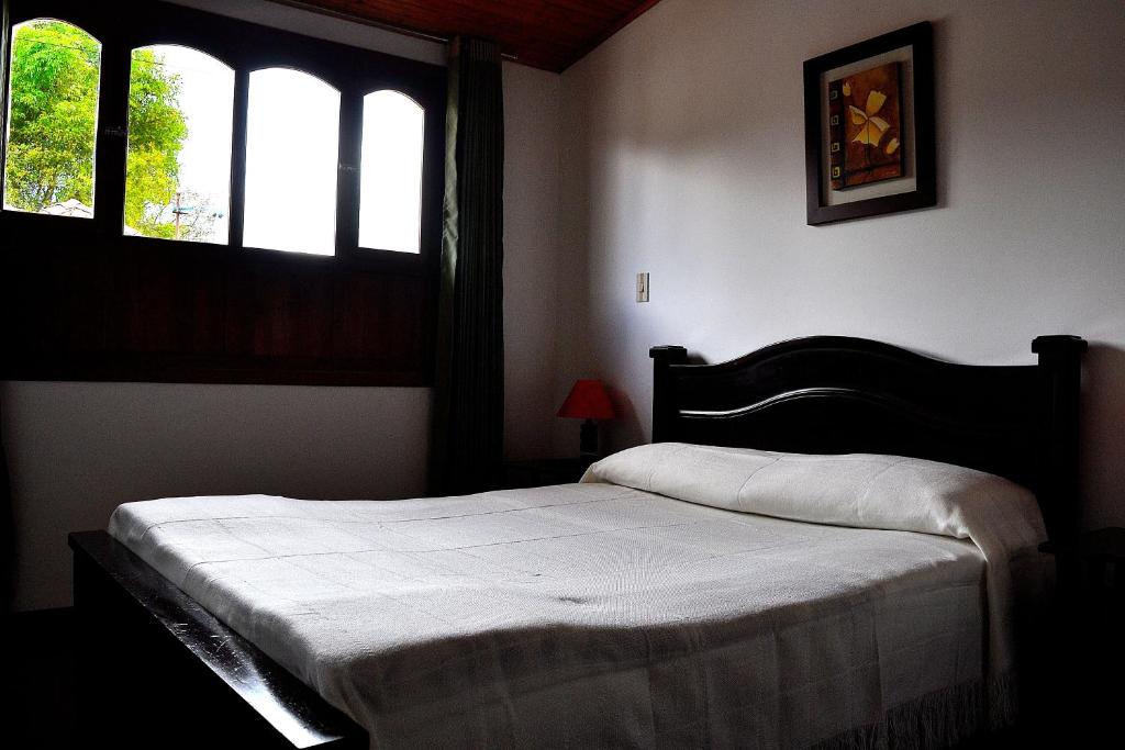 Krevet ili kreveti u jedinici u okviru objekta Hotel Itzamana