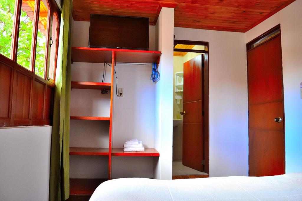 Krevet ili kreveti u jedinici u okviru objekta Hotel Itzamana