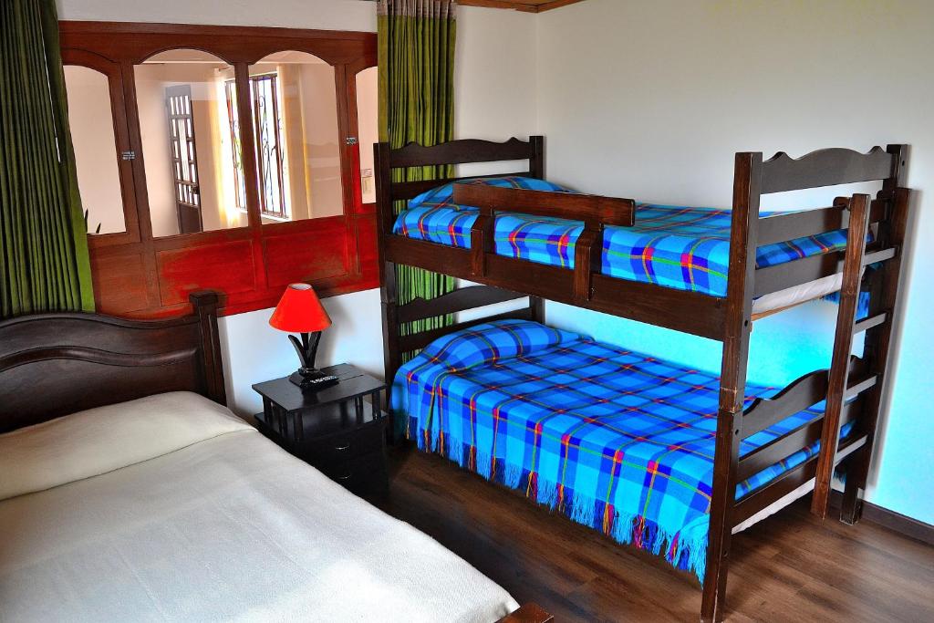 Krevet ili kreveti u jedinici u okviru objekta Hotel Itzamana