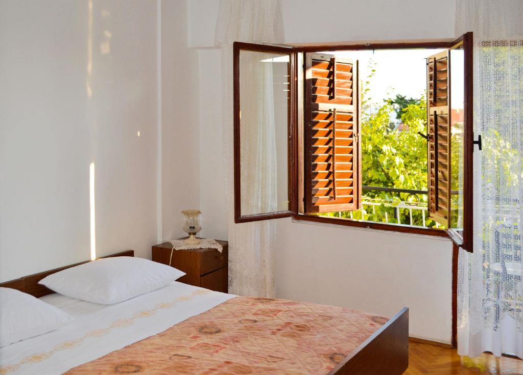 Posteľ alebo postele v izbe v ubytovaní Apartment ANICA