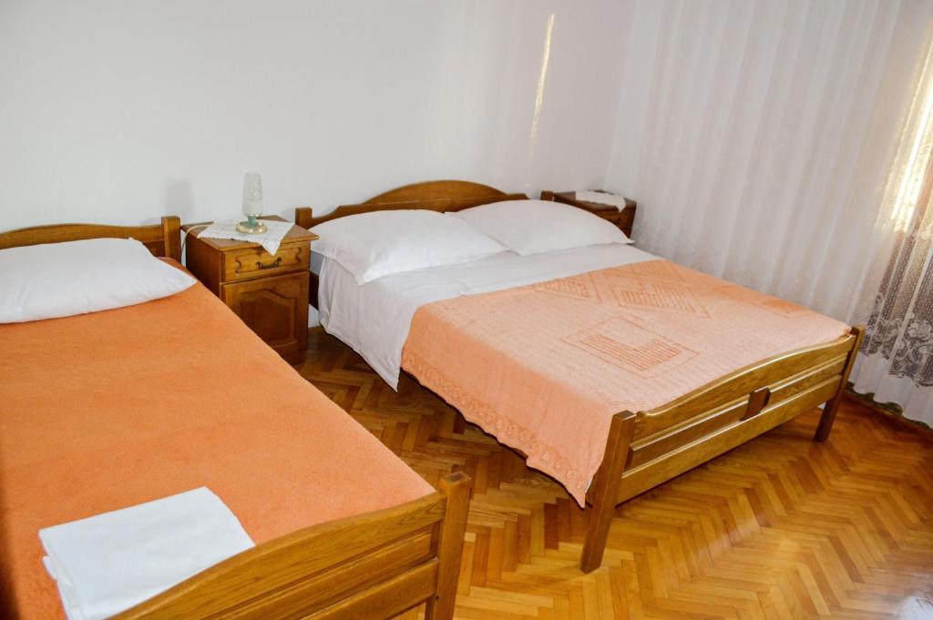 Posteľ alebo postele v izbe v ubytovaní Apartment ANICA