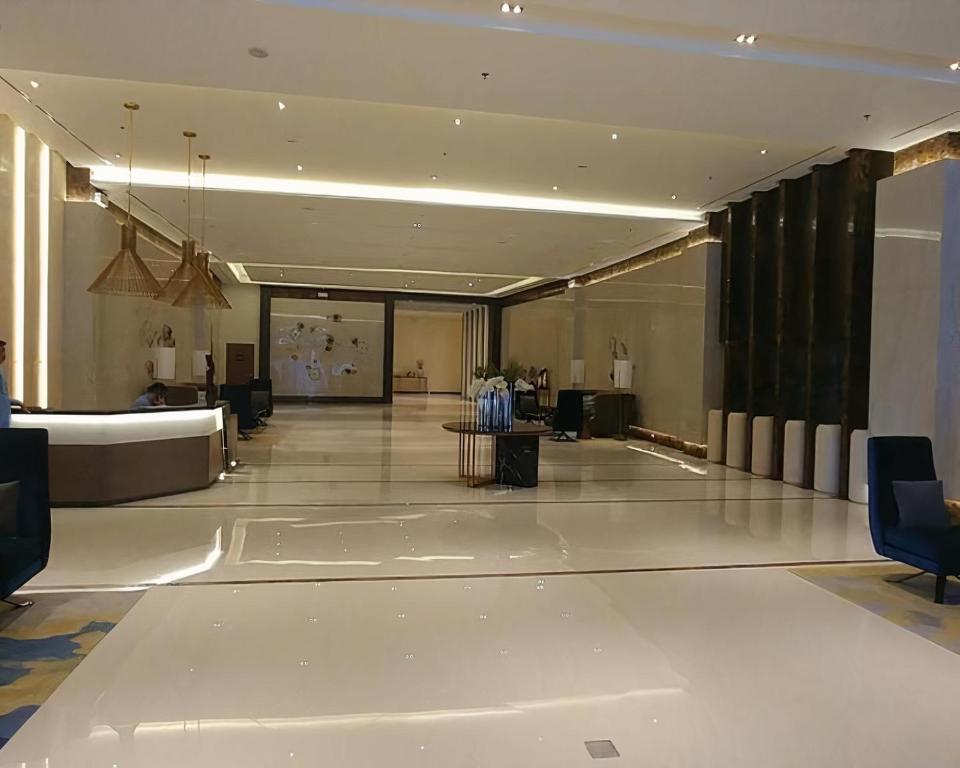a lobby of a building with a waiting room at Mactan Newtown Seaview at One Pacific Residence in Mactan