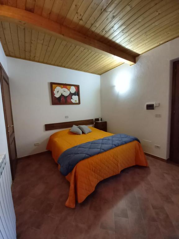 Postel nebo postele na pokoji v ubytování Casa Vacanze La Venarella