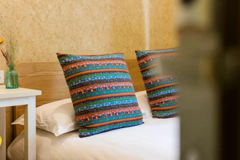 Postel nebo postele na pokoji v ubytování Hangzhou Citynest Music B&B