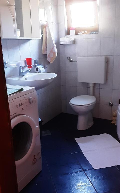 Kúpeľňa v ubytovaní Apartments Nena 3*