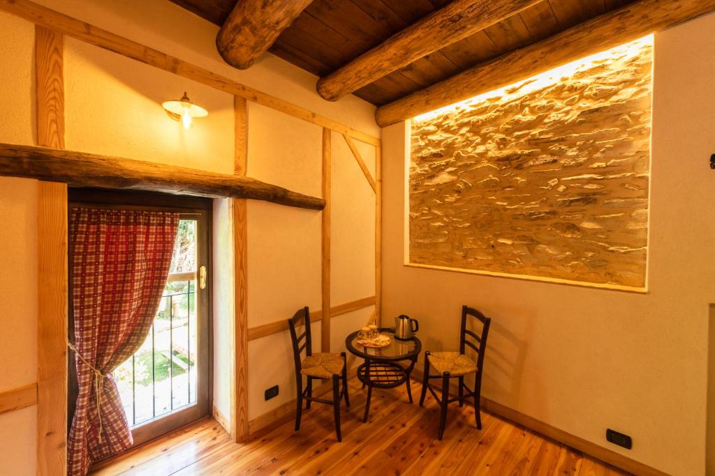 Fotografie z fotogalerie ubytování Camera in legno immersa nella natura - IDUEVAGAMONDI ospitalità rurale di montagna v destinaci Chiusa di Pesio