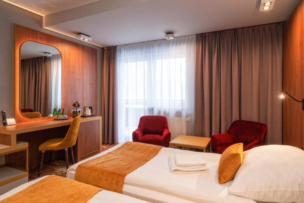 Postel nebo postele na pokoji v ubytování Hotel Stok