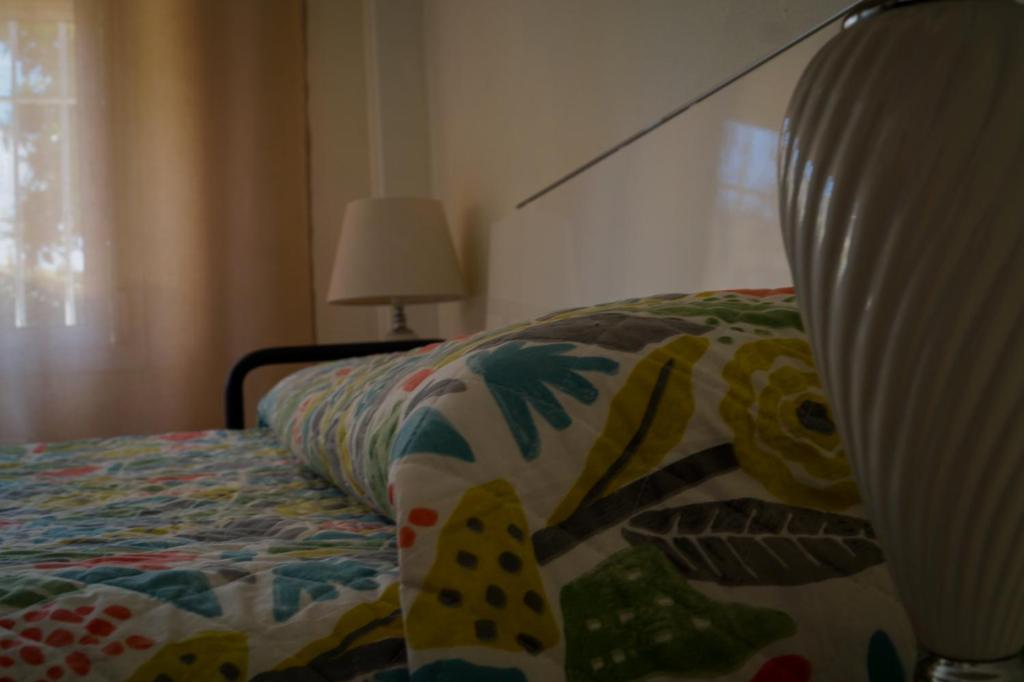 Postel nebo postele na pokoji v ubytování La perla de oasis