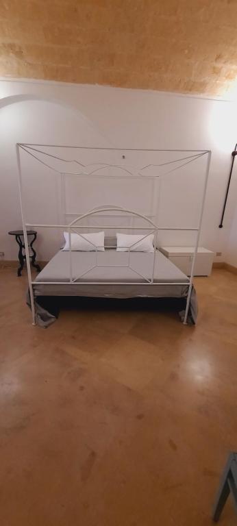 Postel nebo postele na pokoji v ubytování Palazzo Bernardini B & B