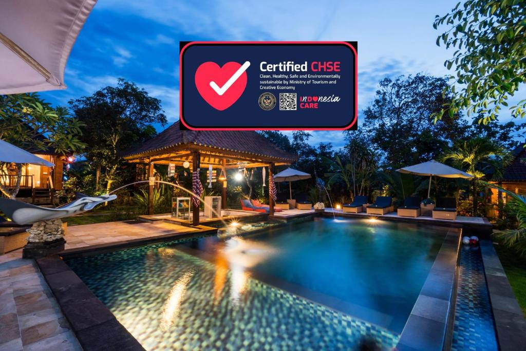 a sign that reads certified cafe next to a swimming pool at Sunset Garden Nusa Lembongan in Nusa Lembongan