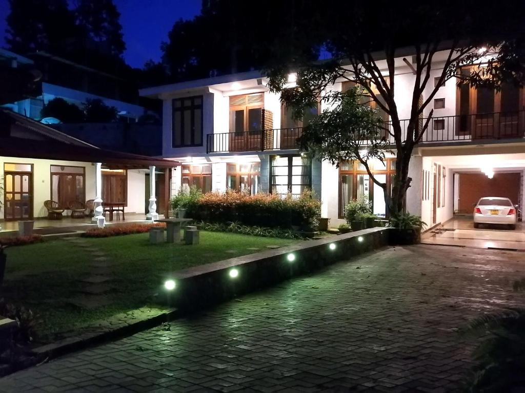 Zahrada ubytování Ella Inn Hotel