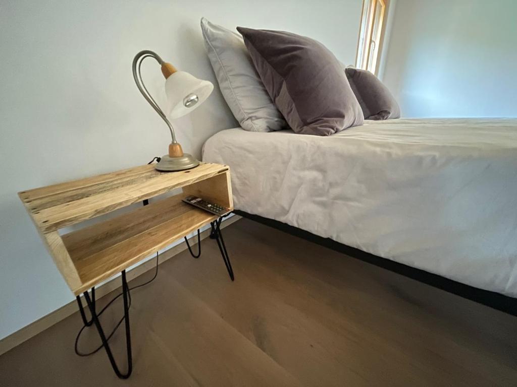 Postel nebo postele na pokoji v ubytování B&B La Forge de Diogne