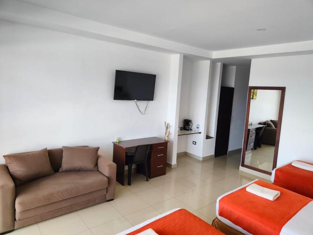 TV a/nebo společenská místnost v ubytování Hotel Punta Azul
