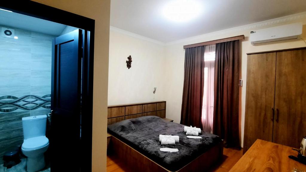Postel nebo postele na pokoji v ubytování HOTEL KOSHKI