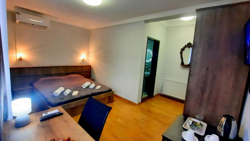 Postel nebo postele na pokoji v ubytování HOTEL KOSHKI
