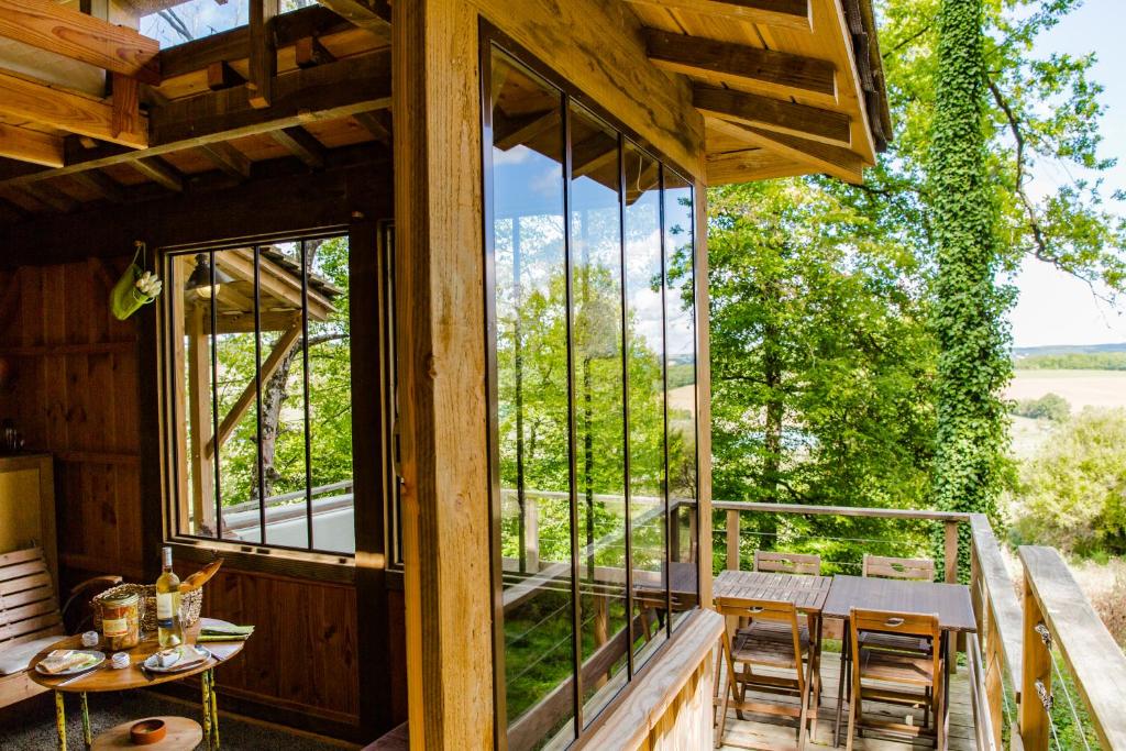 a view from the porch of a tree house at Domaine d'Escapa in Estipouy