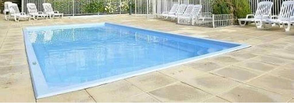 Swimming pool sa o malapit sa ESCAPADE FAMILIALE A LA MER