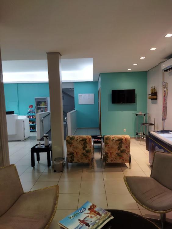 TV a/nebo společenská místnost v ubytování MFG Hotel