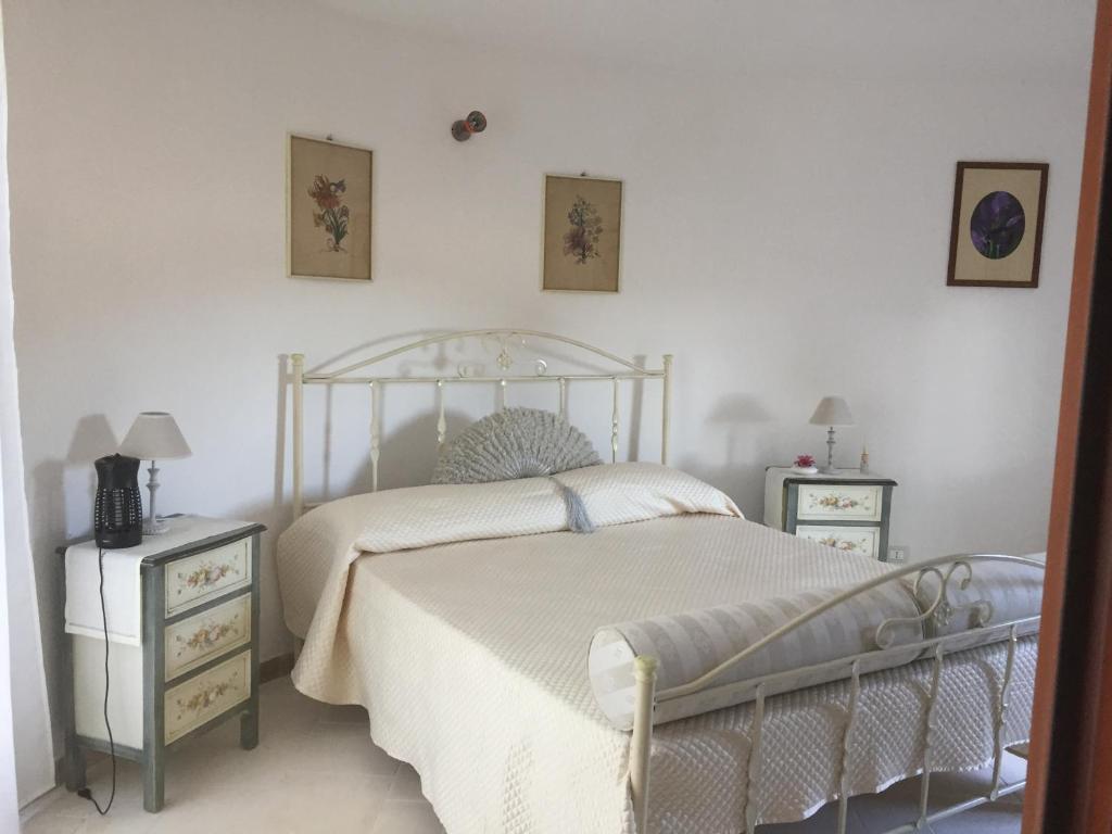 Postel nebo postele na pokoji v ubytování Masseria Battaglini