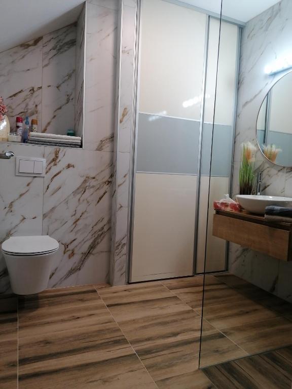 Kúpeľňa v ubytovaní Apartmani Sunset