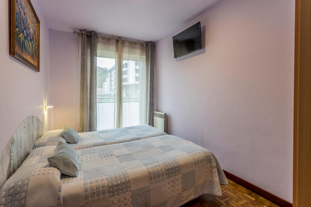Posteľ alebo postele v izbe v ubytovaní Paseo Antzieta 31. 1E