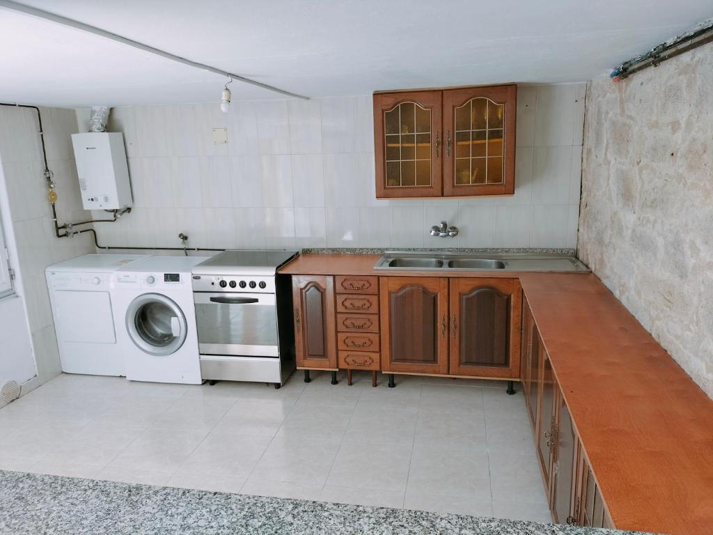 Kuchyňa alebo kuchynka v ubytovaní Casa das Mareas
