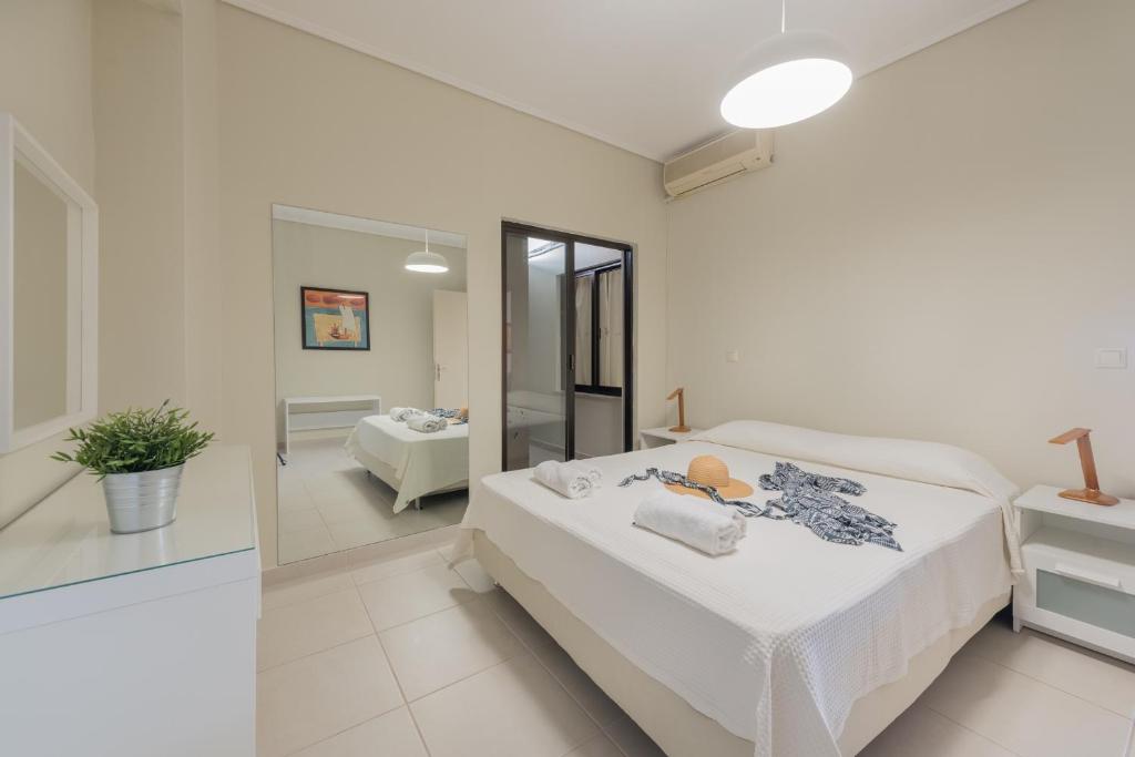 Posteľ alebo postele v izbe v ubytovaní Phoenix Apartments