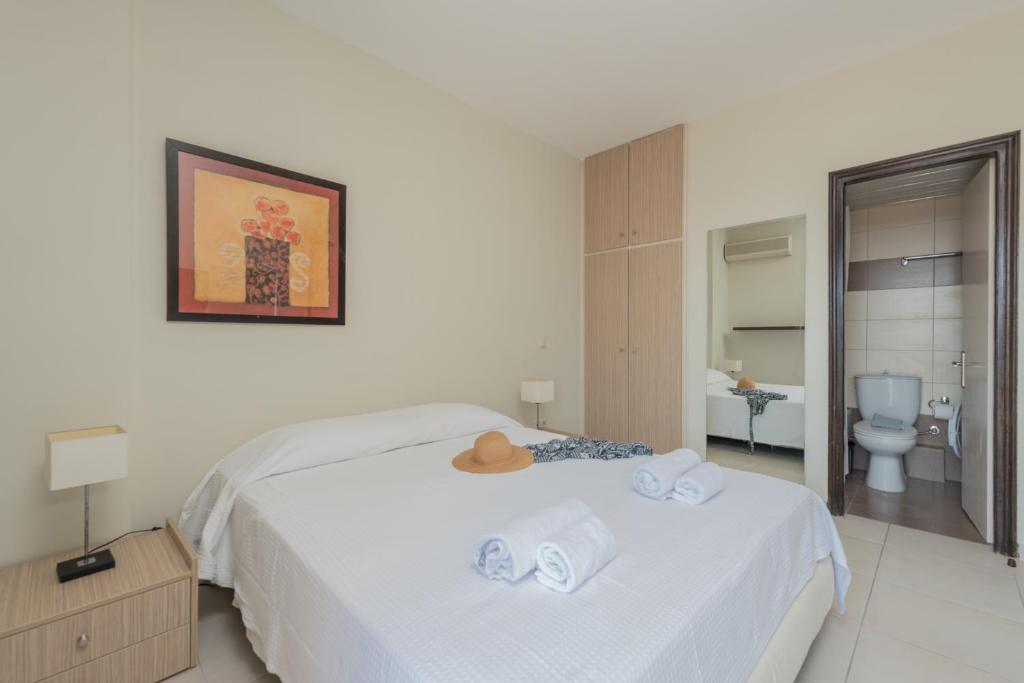 Posteľ alebo postele v izbe v ubytovaní Phoenix Apartments