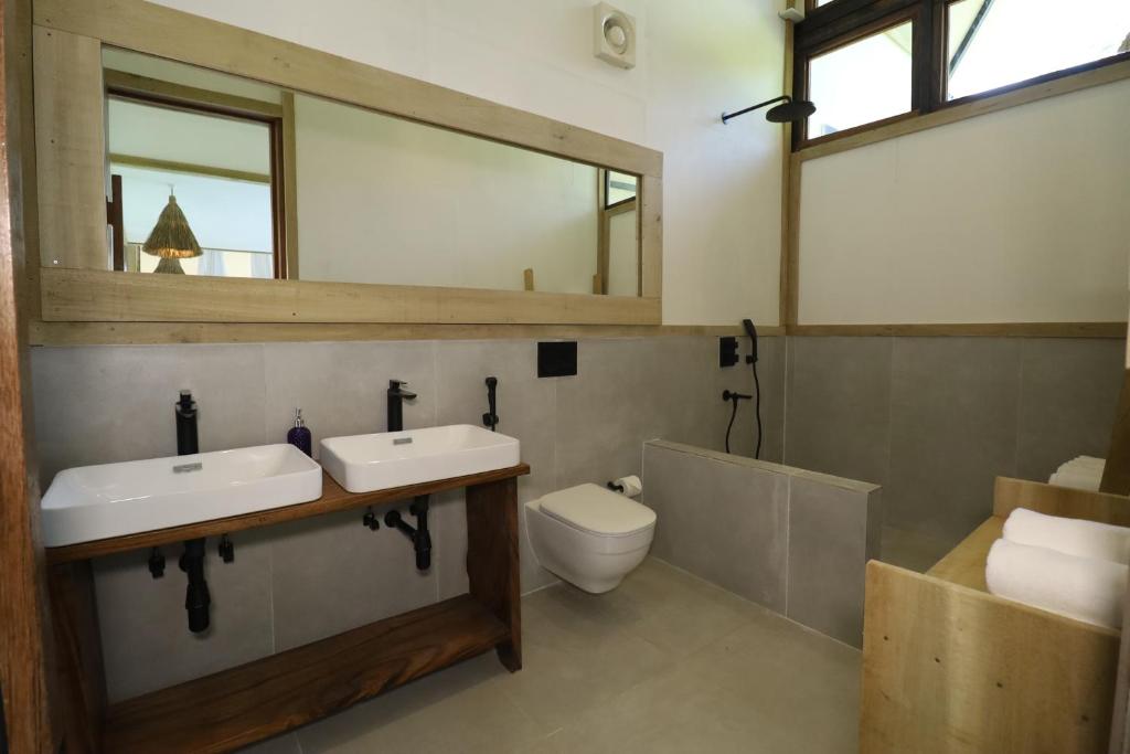 Koupelna v ubytování Satya Boutique Resort & Spa