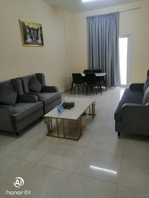 Area soggiorno di Al Rawda Apartments -Ajman
