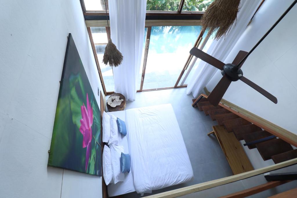 TV a/nebo společenská místnost v ubytování Satya Boutique Resort & Spa